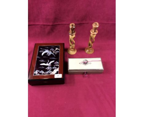 A Japanese mother of pearl inlaid box and cover; a pair of open twist candlesticks; and a small trinket box with key 