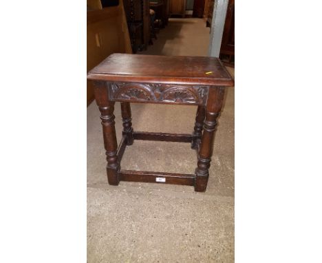 A reproduction oak joint stool 
