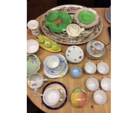 A Carltonware condiment set; a Carltonware dish; two green leaf plates; a large Victorian meat plate etc. 