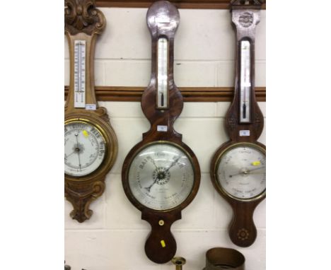 A 19th Century mahogany and ebony inlaid barometer