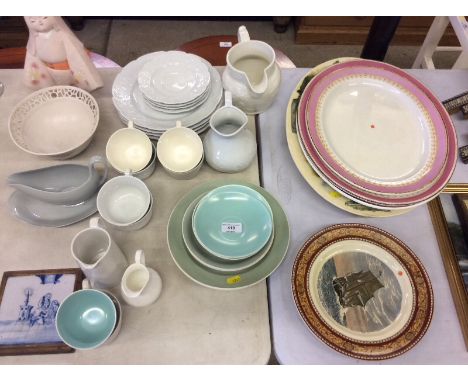 A Delft tile in wooden surround; various oriental Poole pottery and other teaware, meat plates etc. 
