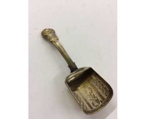 A George III silver caddy spoon