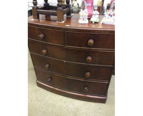 A Victorian mahogany bow front chest fitted two short over three long drawers 