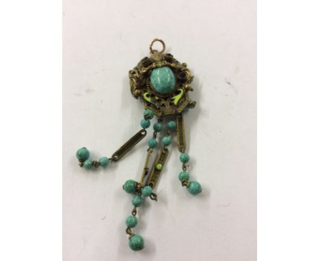 An Austrian Hungarian pendant with semi precious stone having enamel and turquoise decoration