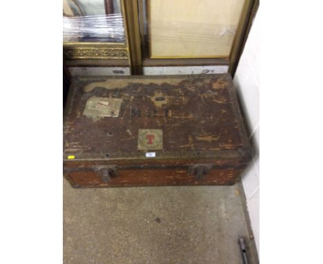 A metal and canvas travelling trunk with contents of two book troughs; a wall mirror; a mahogany shelf etc.