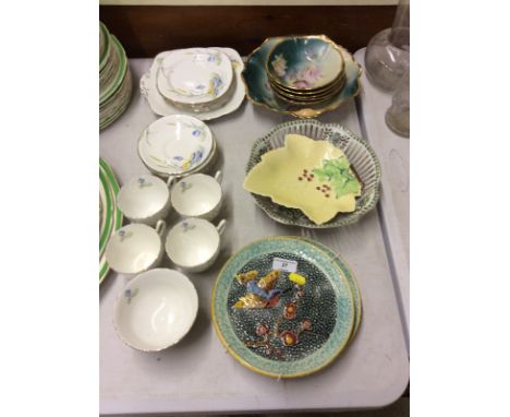 A quantity of Royal Stafford floral decorated teaware; a pair of Majolica style wall plates decorated with birds; a Carltonwa