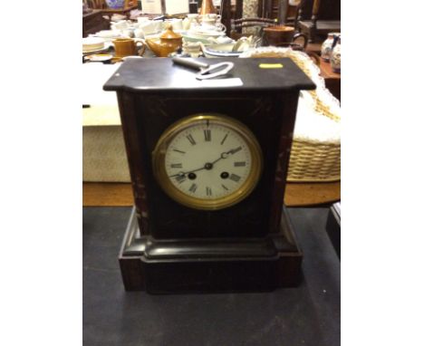 A late Victorian black slate and rouge marble two hole mantel clock - key on rostrum 