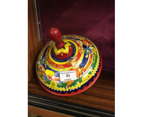 A Chad Valley tin plate spinning top