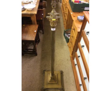 A heavy brass standard lamp with corinthian column 