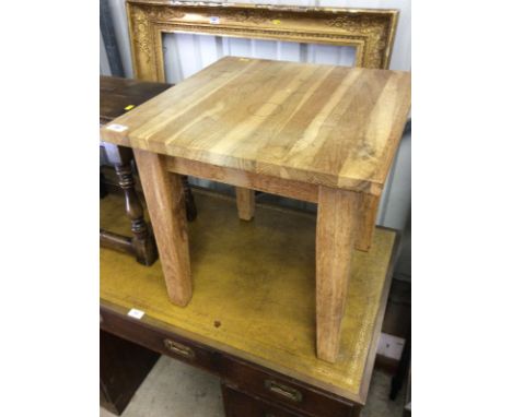 A light oak coffee table and an oak joint stool