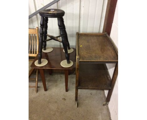 An elm stool; an oak two tier trolley and a polished wood coffee table