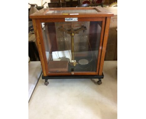 A mahogany cased Oertling set of chemist scales