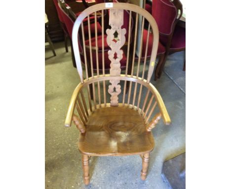 An elm stick back Windsor chair