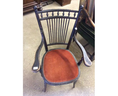 An Edwardian beech stick back chair