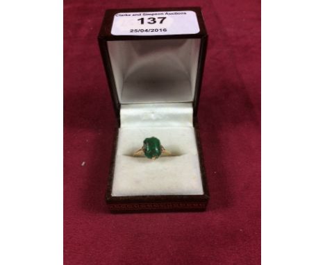 A 9ct gold jade set ring