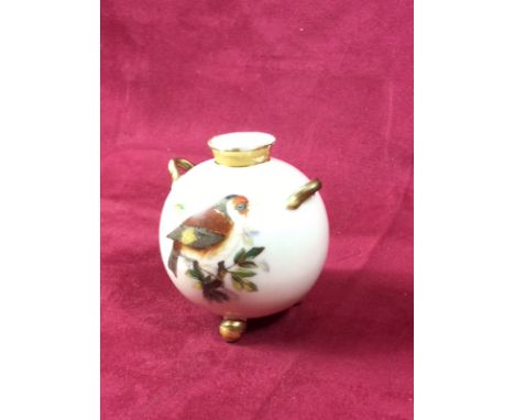 A Royal Worcester vase decorated with birds (restored)