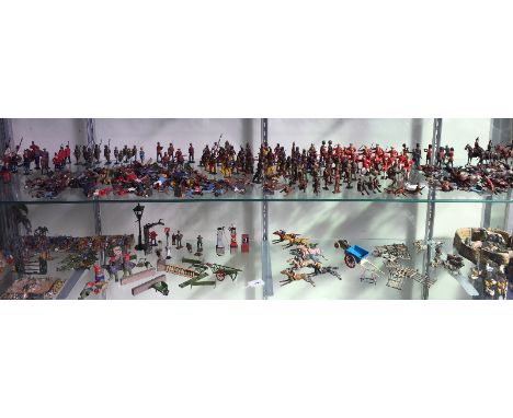 A large quantity of Britains and other lead fences, lamp posts, farm animals, palm trees, race horses, military figures, cowb