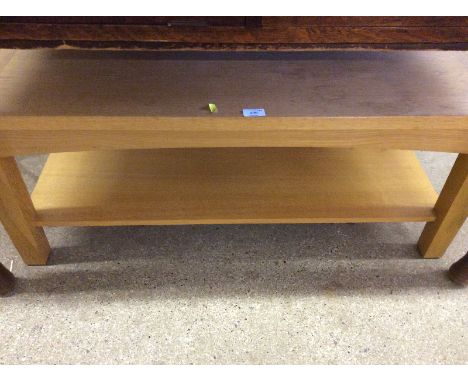 A light oak two tier coffee table