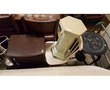 A stick back kitchen chair; a jardinière stand; a wicker and wooden three drawer chest and a carved wooden two tier table