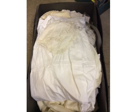 A box of children's vintage clothing