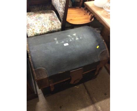 A canvas and leather bound trunk initialled L M