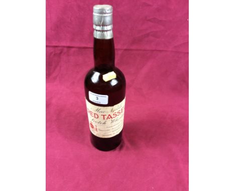 A bottle of Red Tassel Scotch whisky
