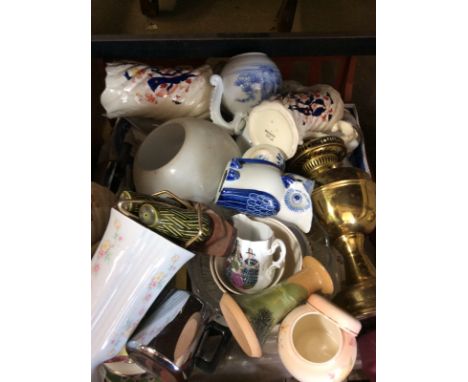 A box of various china and a case containing a projector