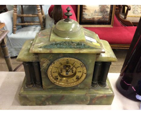 A late Victorian onyx two hole mantel clock 