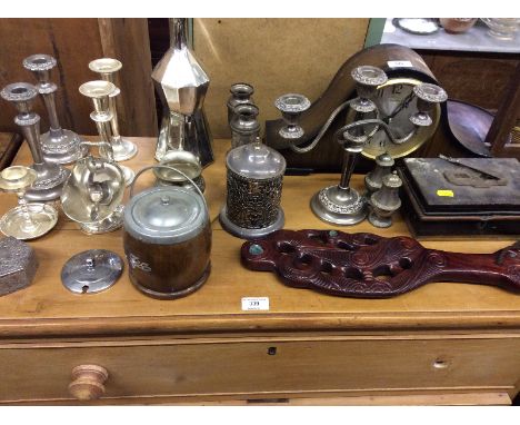 A mahogany cased mantel clock and a quantity of various silver plated ware to include candlesticks and a New Zealand teak orn