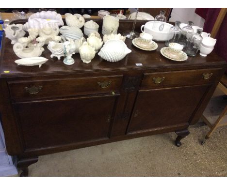 An early 20th Century mahogany sideboard with Art Nouveau stylised decoration