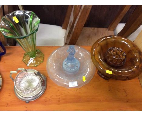 An Art Deco blue glass table centrepiece; a green glass vase; an amber glass rose bowl and stand and a silver plated and glas