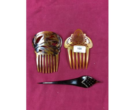 Three Art Nouveau tortoiseshell combs, one with yellow metal inlay 