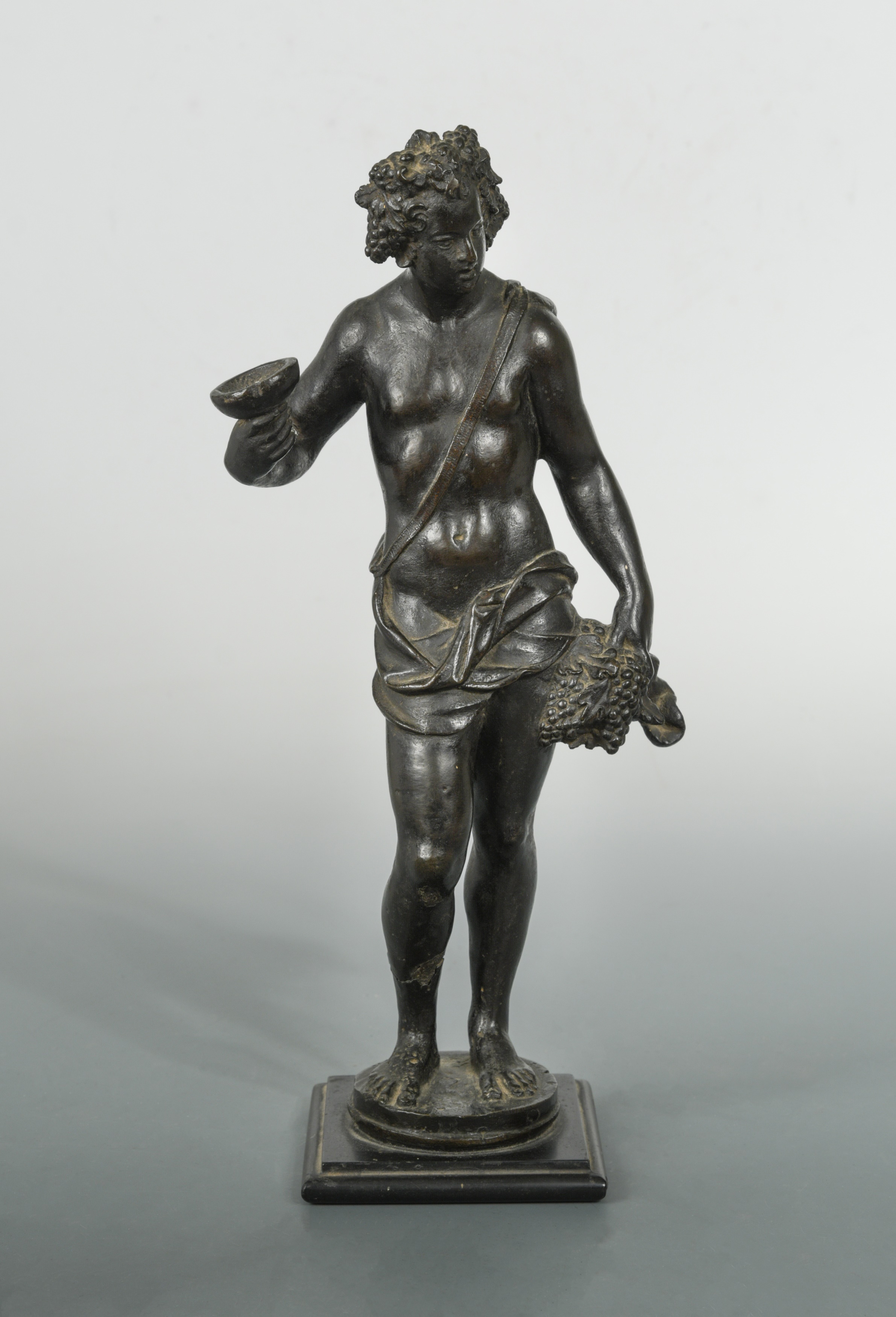 A Bronze Figure Of Bacchus After Michelangelo Probably 17th Century