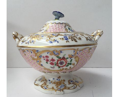 A H & R Daniel twin handled sucrier and cover moulded and painted with floral designs, the domed lid with flower finial above