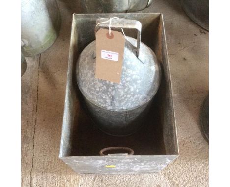 A galvanised trough; and the top of a galvanised drinker 