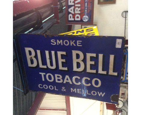 A double sided wall mounted Blue Bell Tobacco enamel sign, (14ins. x 20ins. approx.)