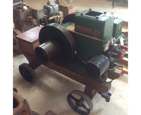 A Crossley stationary engine. 2.5HP. Engine number 128029. Type PH1030. On four wheel trolley