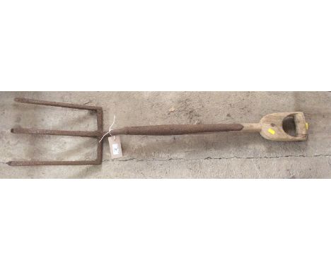 A three prong wide garden fork