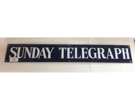 A Sunday Telegraph enamel sign, (22.5ins. x 3.5ins. approx.)