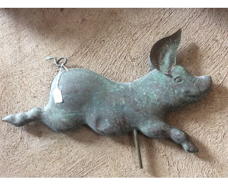 A copper weather vane top in the form a pig