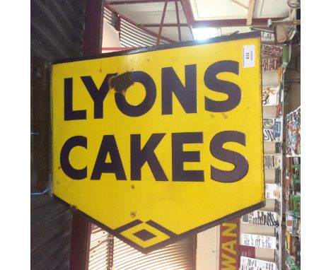 A Lyons Cakes wall mounted double sided enamel sign, (17.5ins. x 15.5ins approx.)
