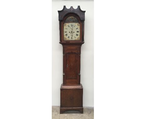 A 19th oak longcase clock, the hood with fluted columns, above a long trunk door, box base and bracket feet, the 32.5cm dial 