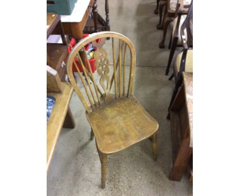 A set of four elm seated stick and wheelback kitchen chairs 