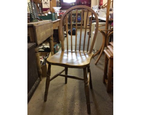 A stick back elbow chair; two elm seated kitchen chairs; and a pine kitchen chair 