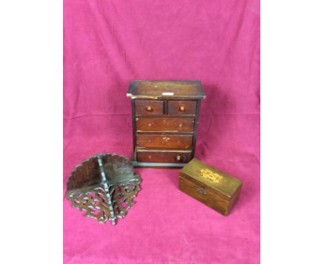 A Victorian mahogany miniature table top chest fitted two short over three long drawers; a mahogany and inlaid two compartmen