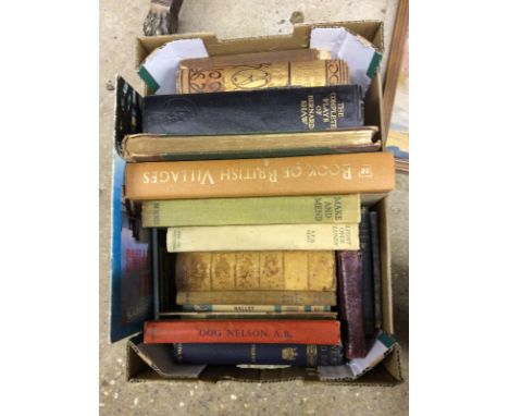A box of books and a coloured print 