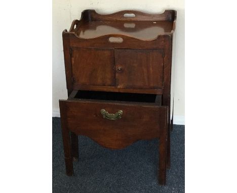 A Georgian mahogany two door commode. est. £30 - £50.