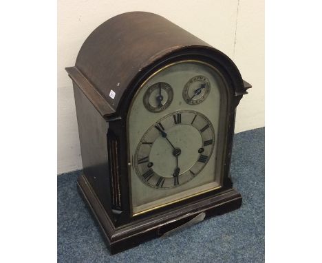 A good Edwardian dome top bracket clock with striking movement to silvered dial. Est. £300 - £400.