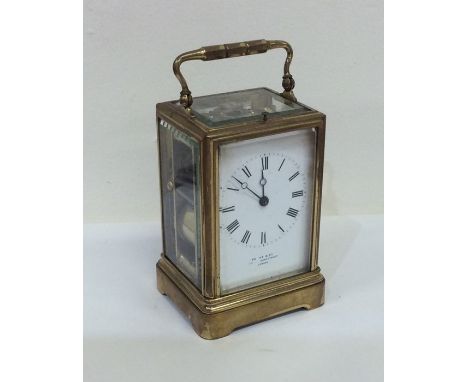 A good brass repeating carriage clock in leather travelling case. By Payne &amp; Co of London. Est. £250 - £350.