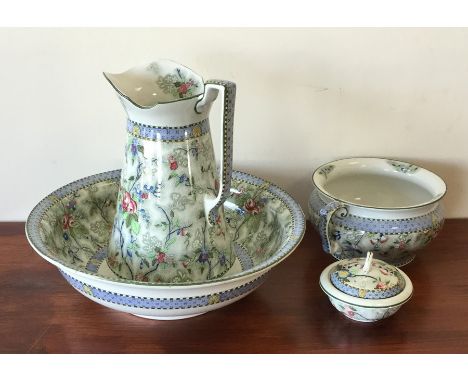 A decorative floral jug and basin set. Est. £20 - £30.